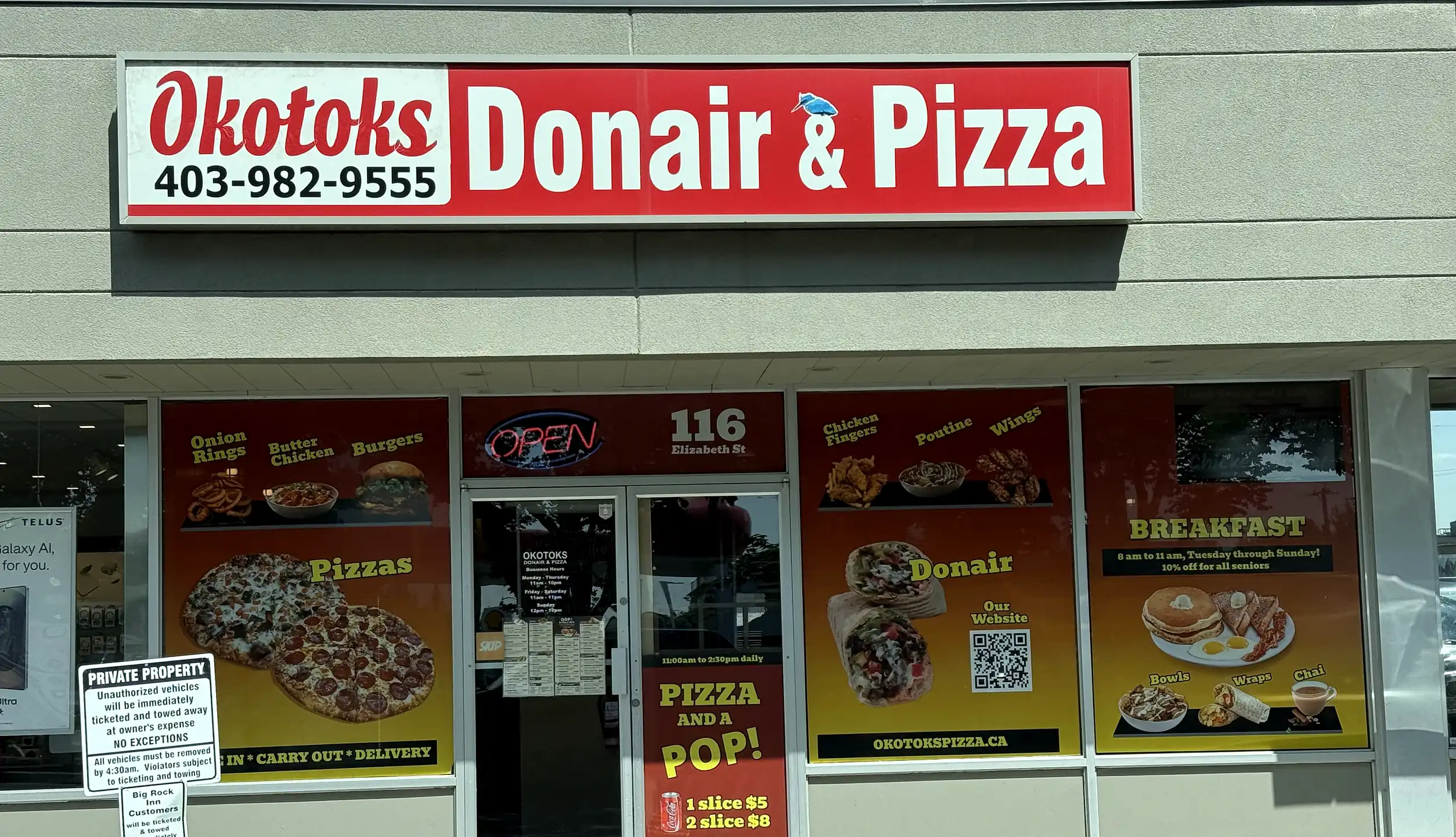 Okotoks Donair & Pizza storefront on Elizabeth Street with its red sign