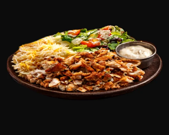 Chicken shawarma platter: sliced chicken shawarma over rice with salad, shredded cheese and a cup of garlic sauce